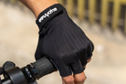 Male rider wearing Euphree UltraGrip Pro Cycling Gloves while gripping the Euphree handlebar, highlighting enhanced grip and shock absorption with silicone gel.