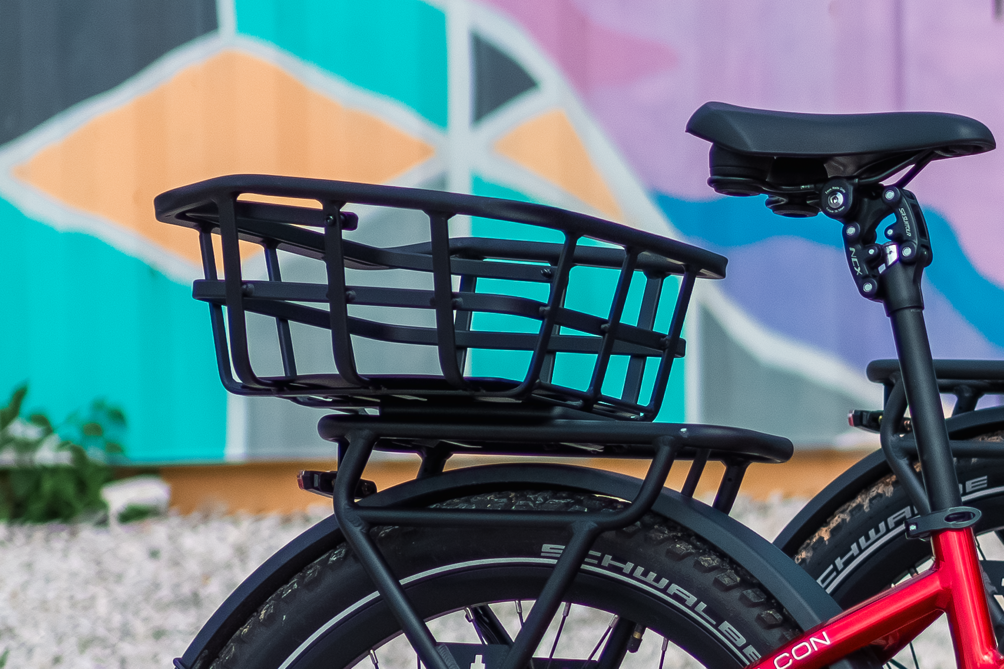 Side view of Euphree rear basket highlighting the lightweight aluminum frame and foldable handle.