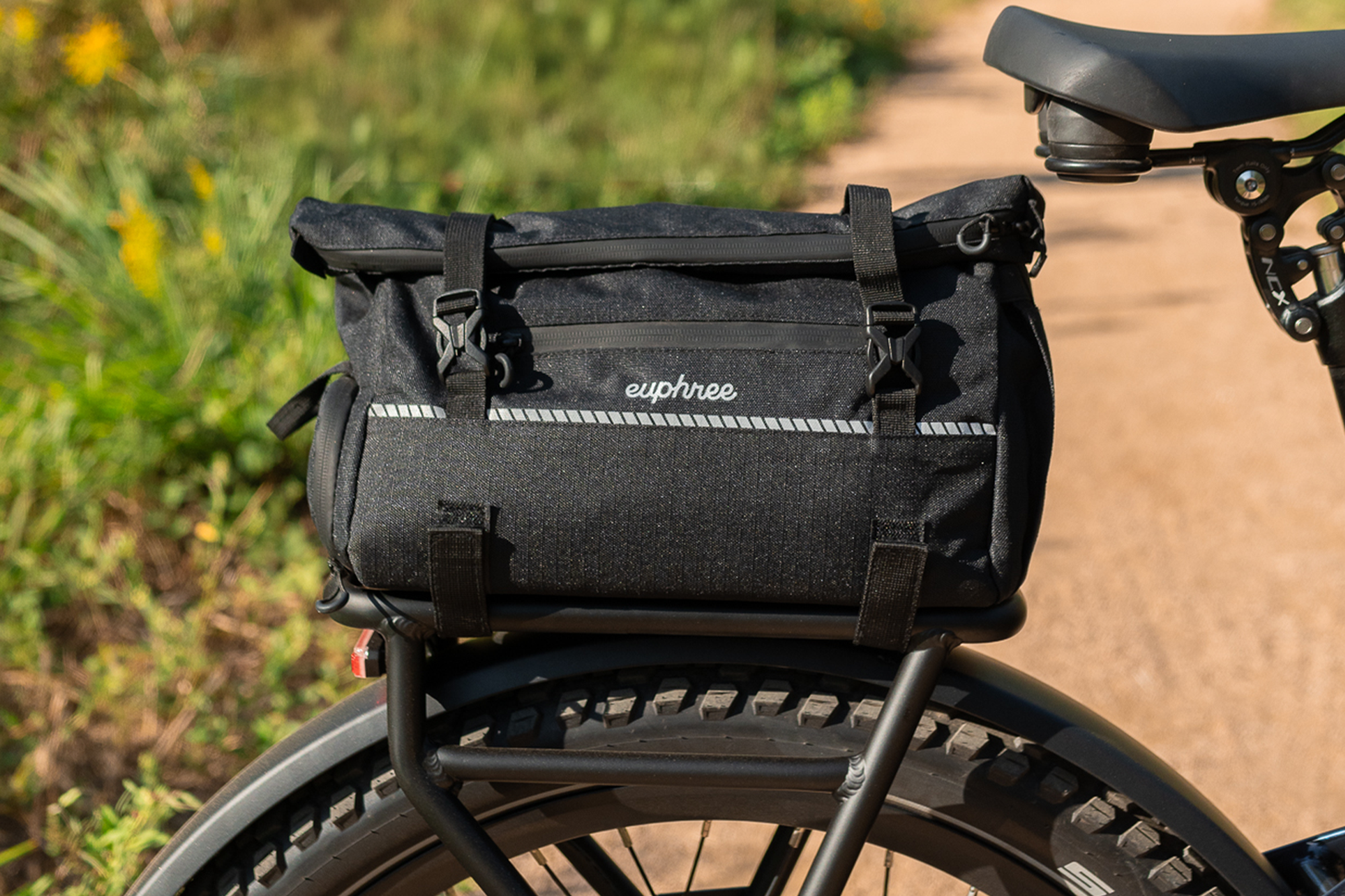 Euphree Trunk Bag mounted on rear rack, showing water-resistant material and reflective accents