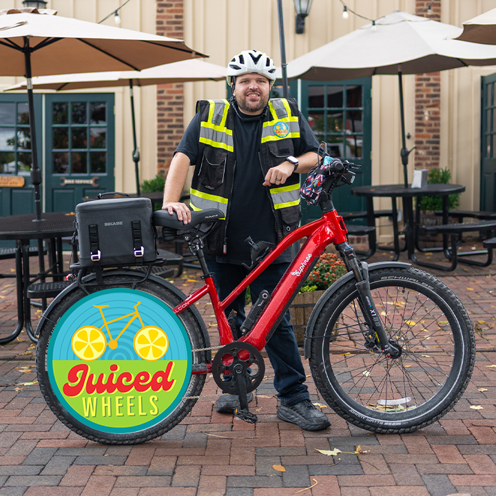 Owner of Juiced Wheels with a Crimson Red Euphree Stellar Falcon ebike.